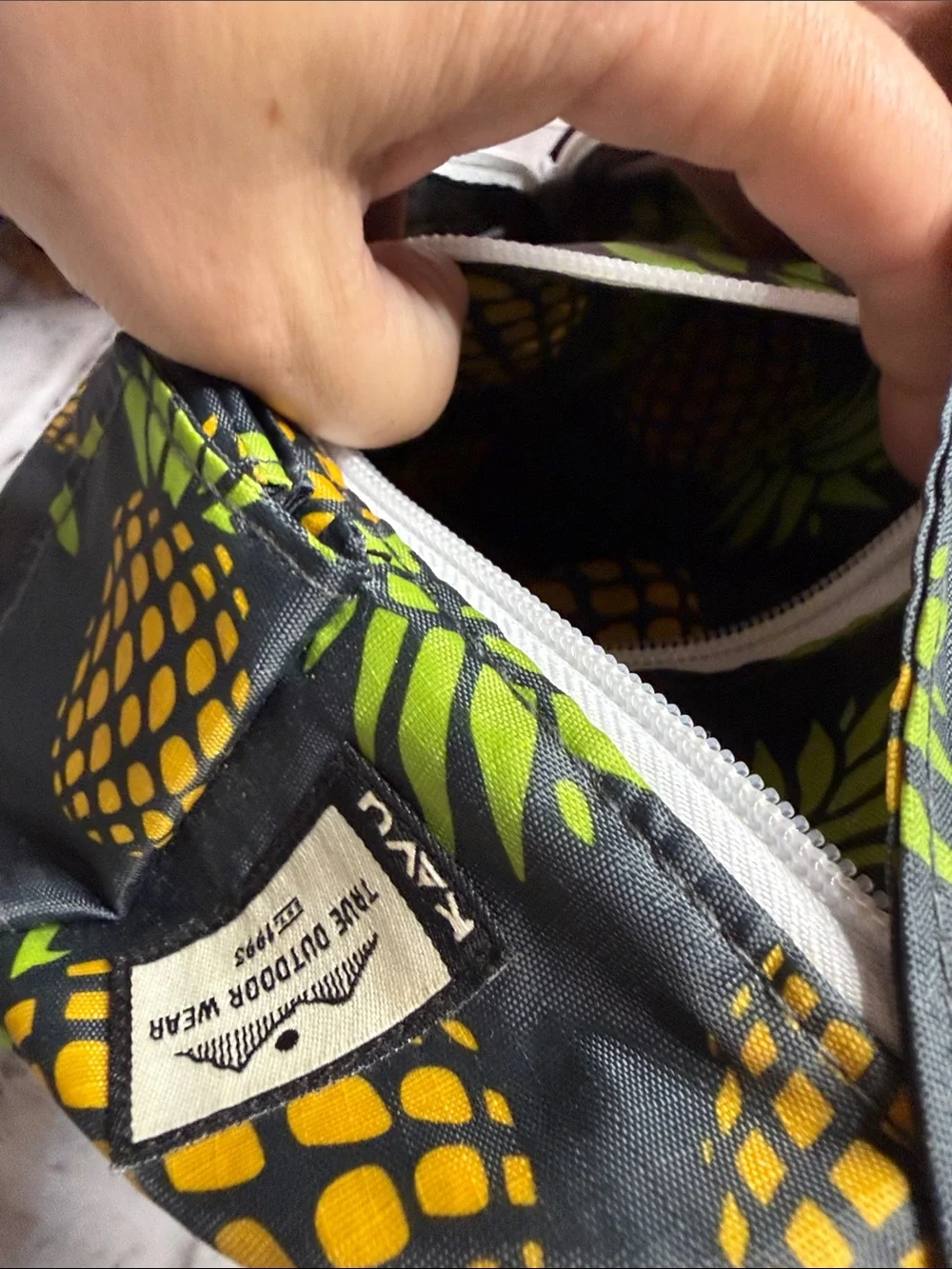 Kavu Black Sling Bag with Yellow Pineapple Print